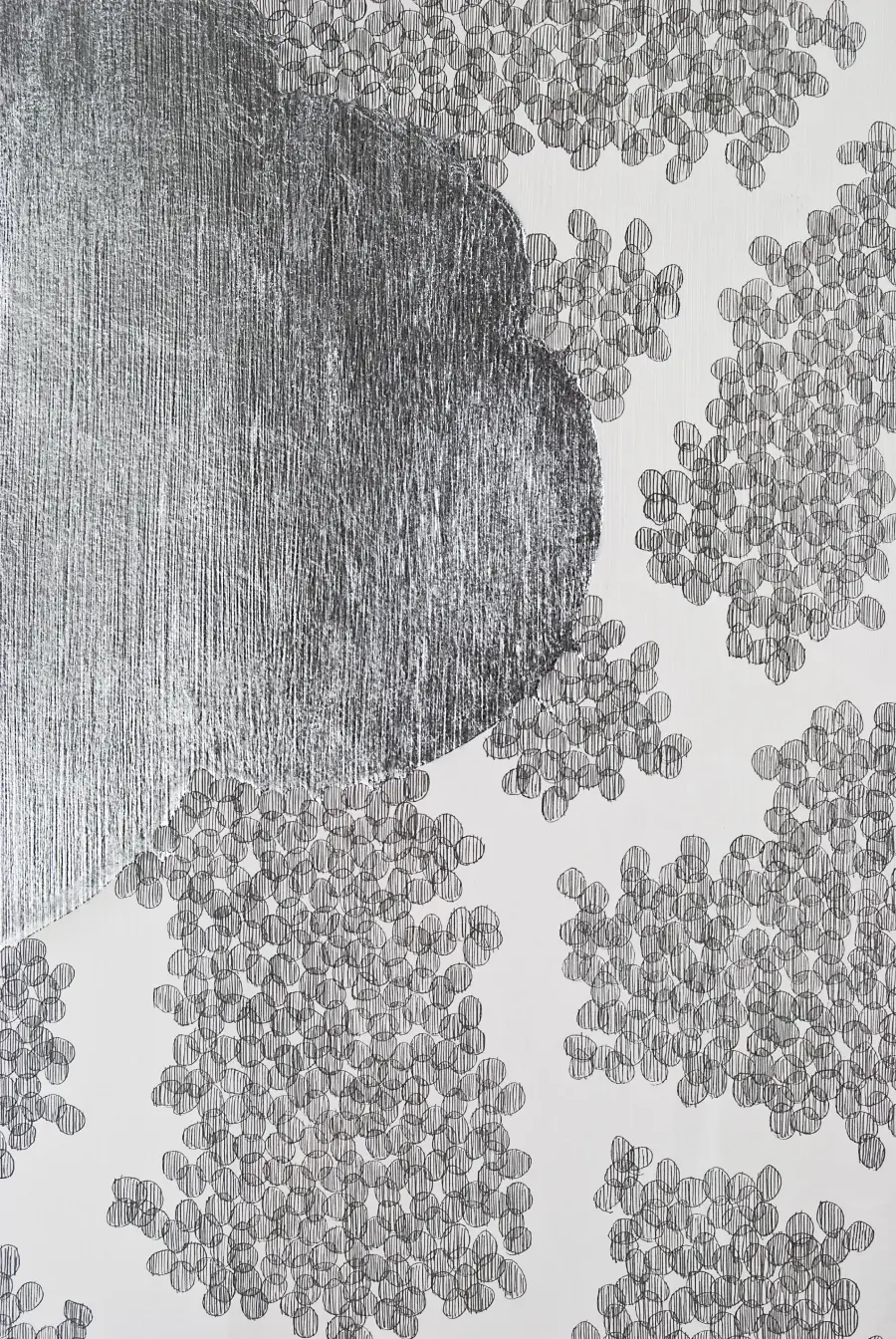 Abstract black and white drawing with textured circles and a shaded organic shape